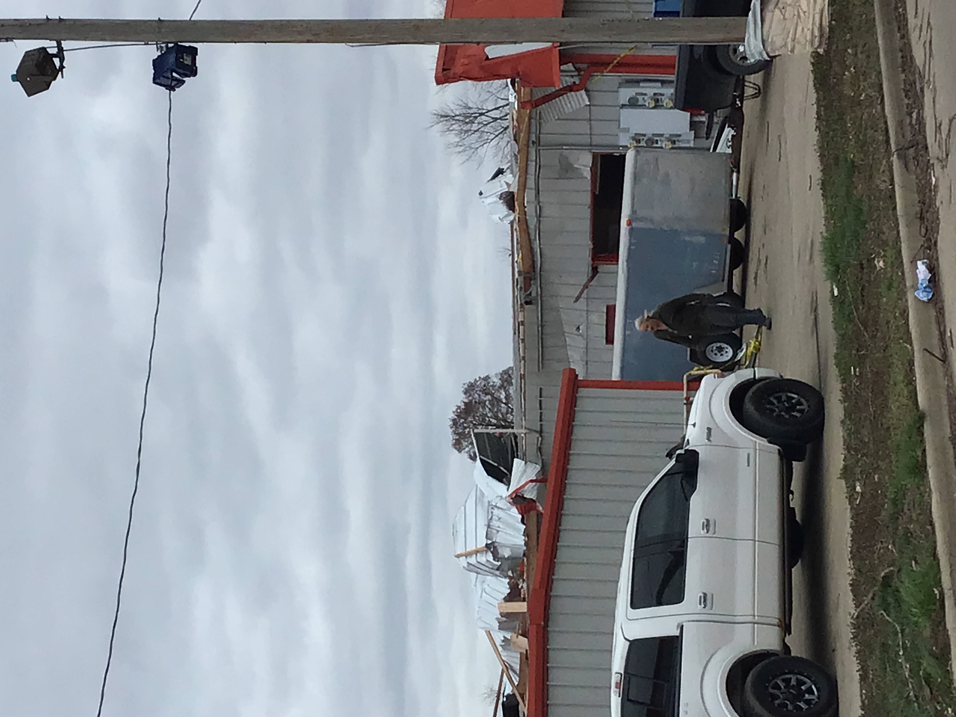 Storage facility with significant roof damage in Salem, IL.