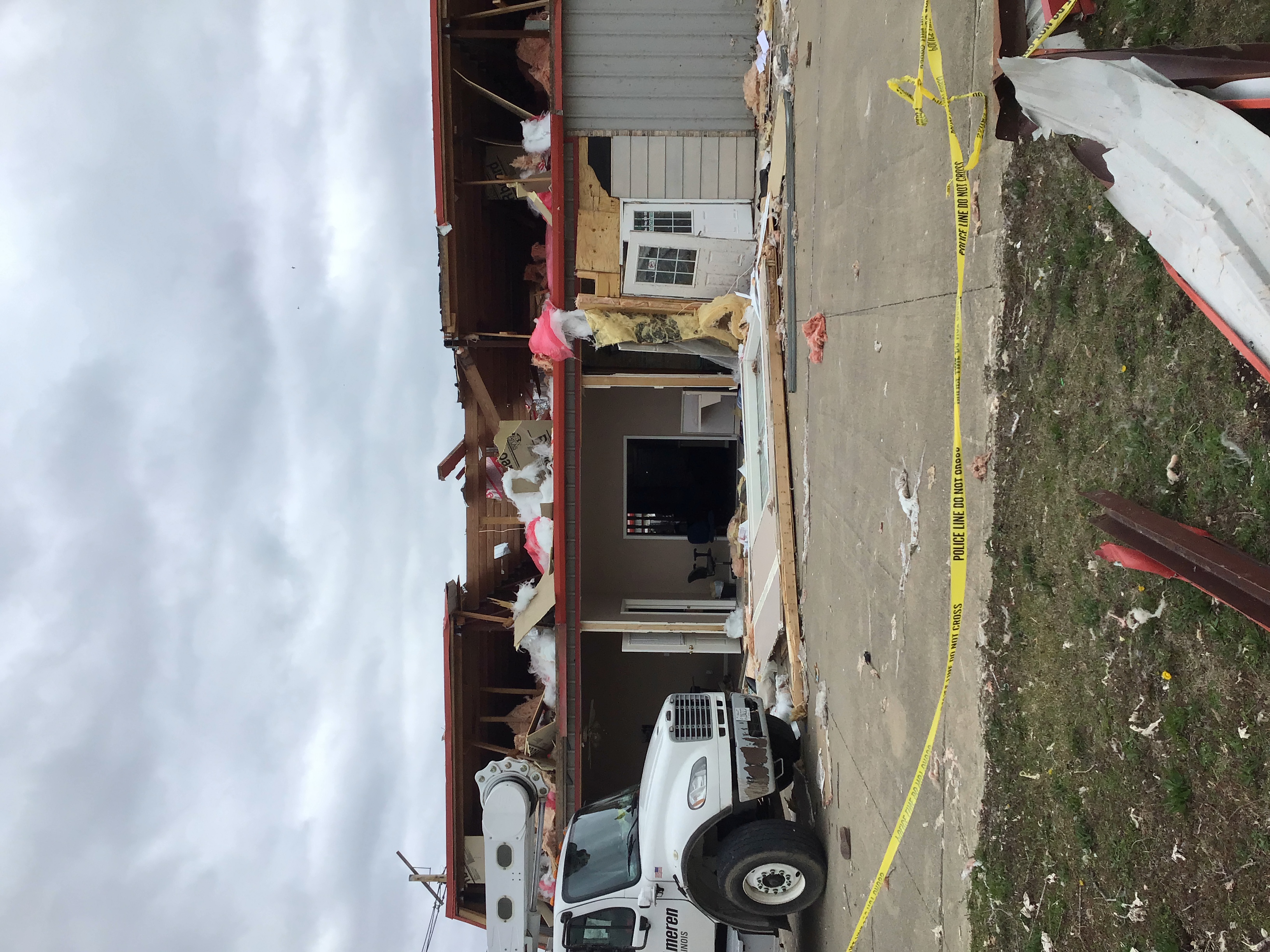 Business on South Broadway in Salem, IL with extensive roof and wall damage.