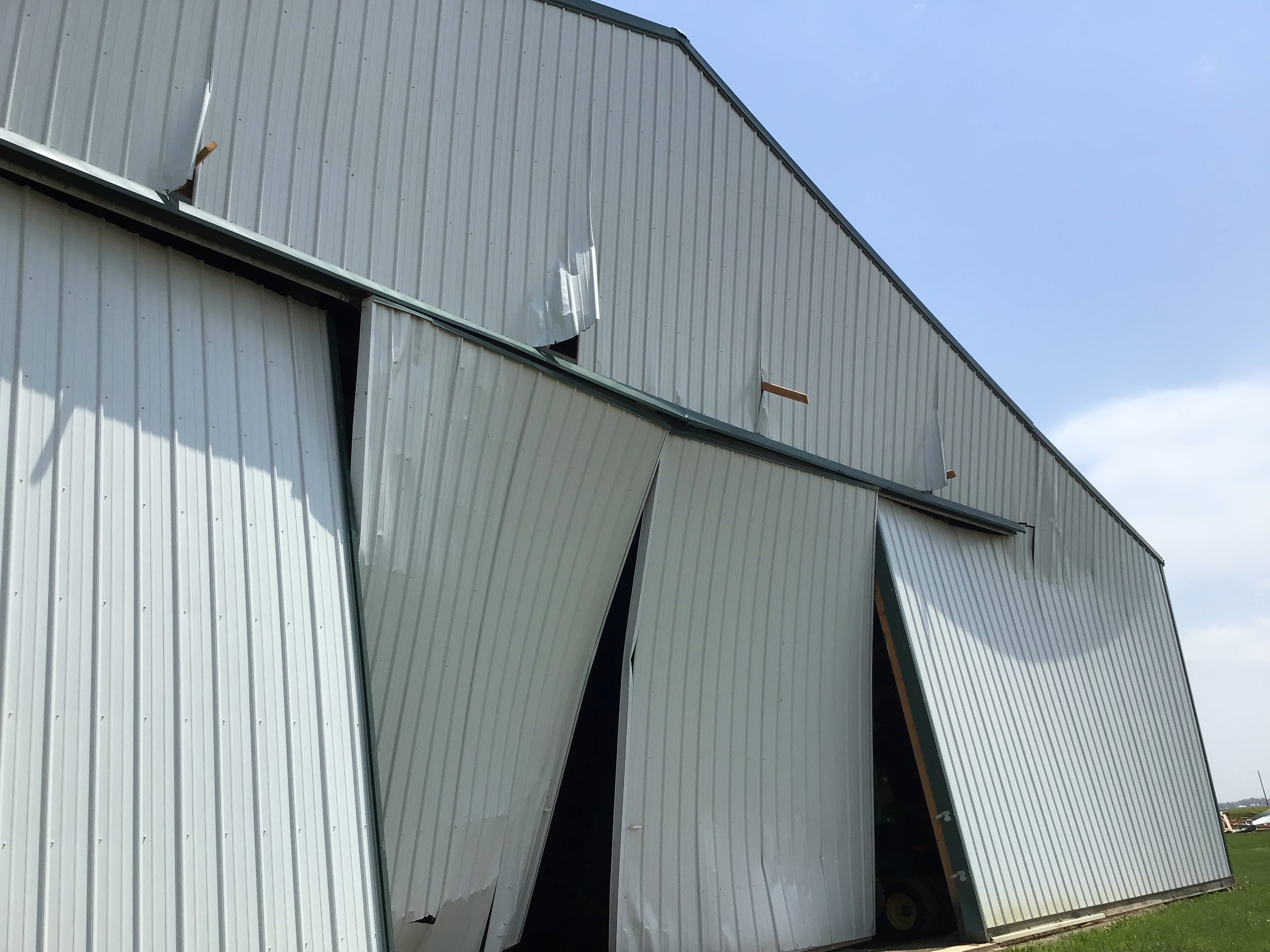 Part of a large outbuilding was damaged off Cardinal Road east of Okawville.