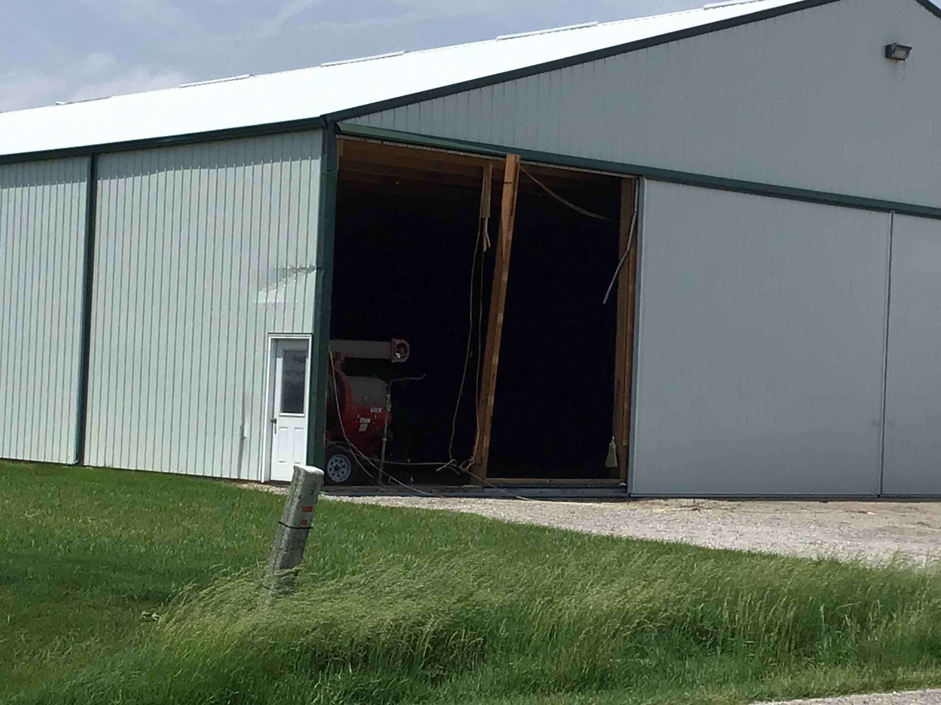 A few walls of an outbuilding were blown out.