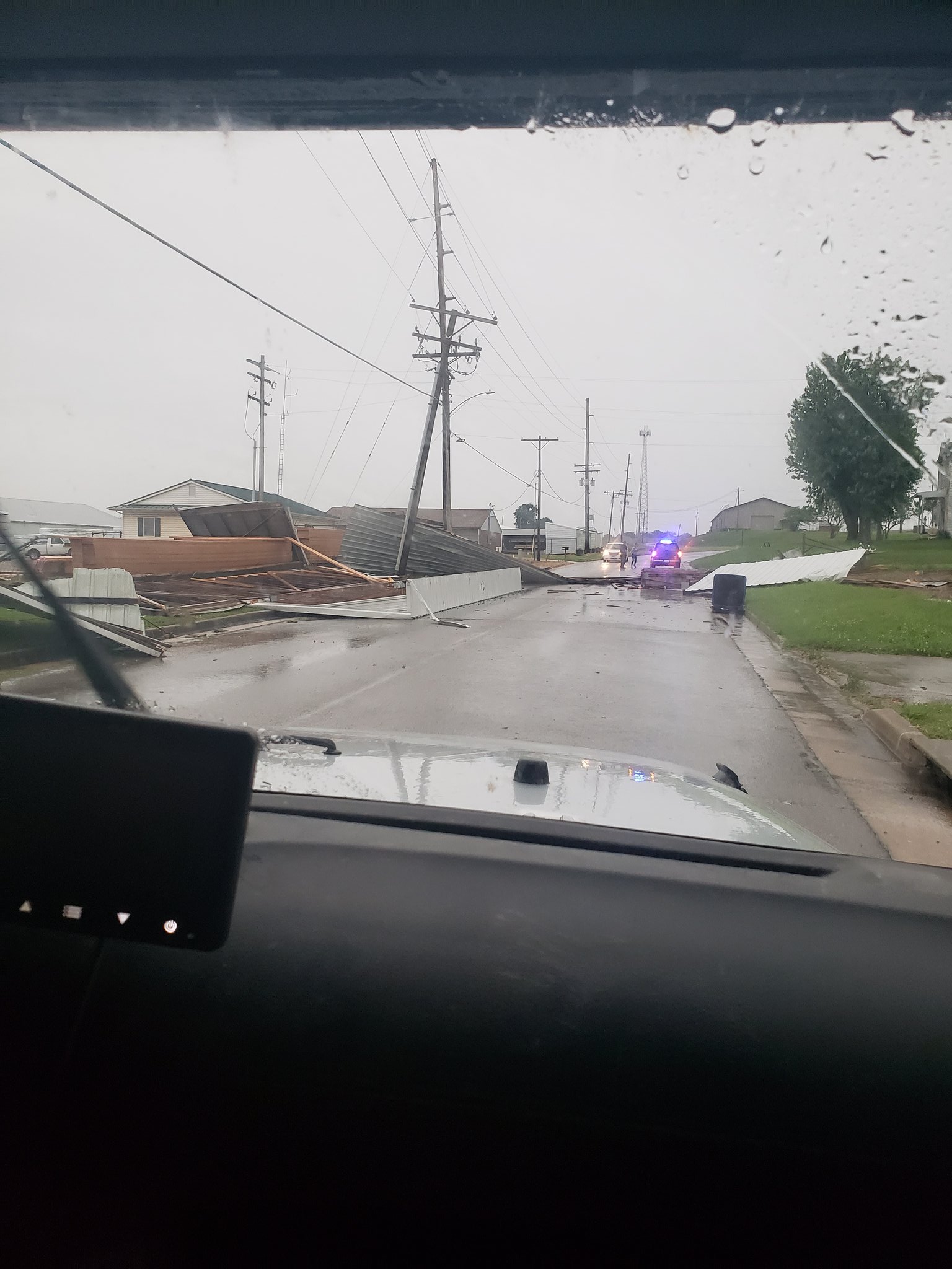 AwningÂ and attached support structure was lofted by straight-line wind, thrown into a utility pole and carried across the street near Chester, IL.