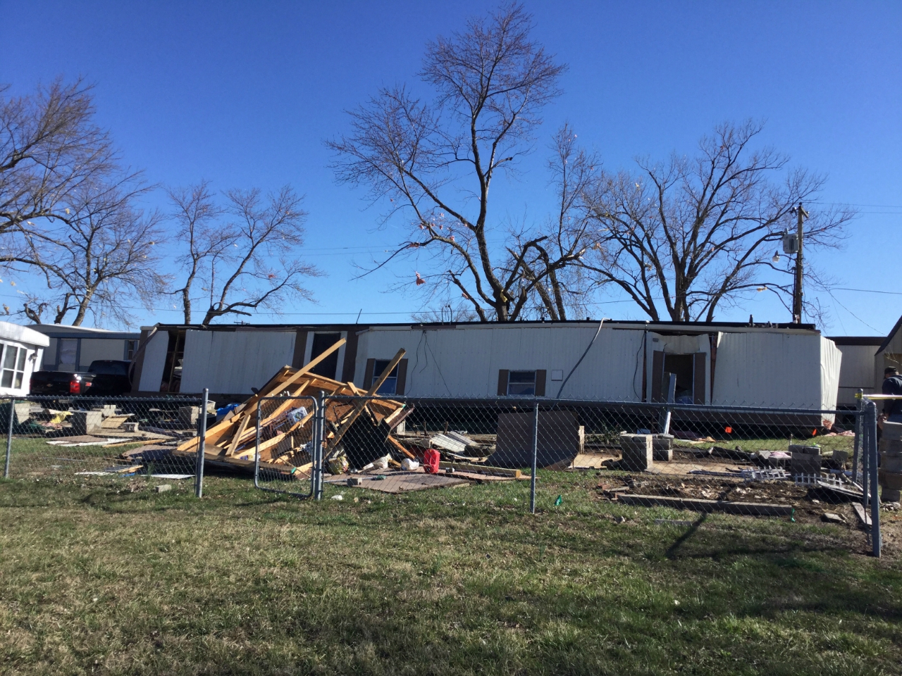 Photo of mobile home rolled over on Lucille Street.