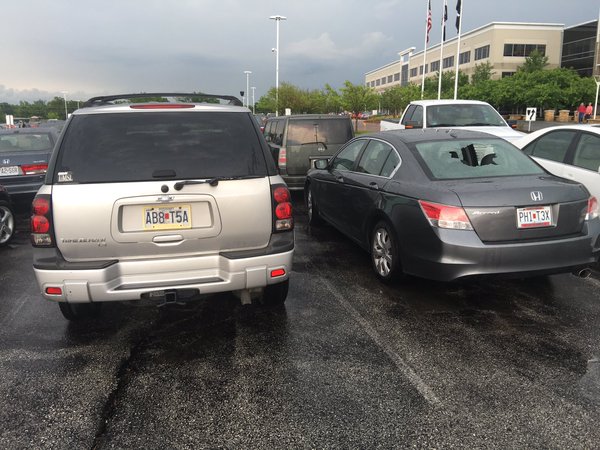 Photo of hail damage to vehicles in O'Fallon, MO.