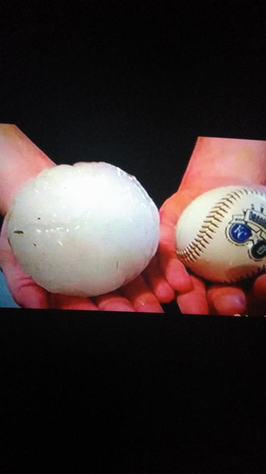 Photo of hail larger than a baseball that fell near Bunker, MO.