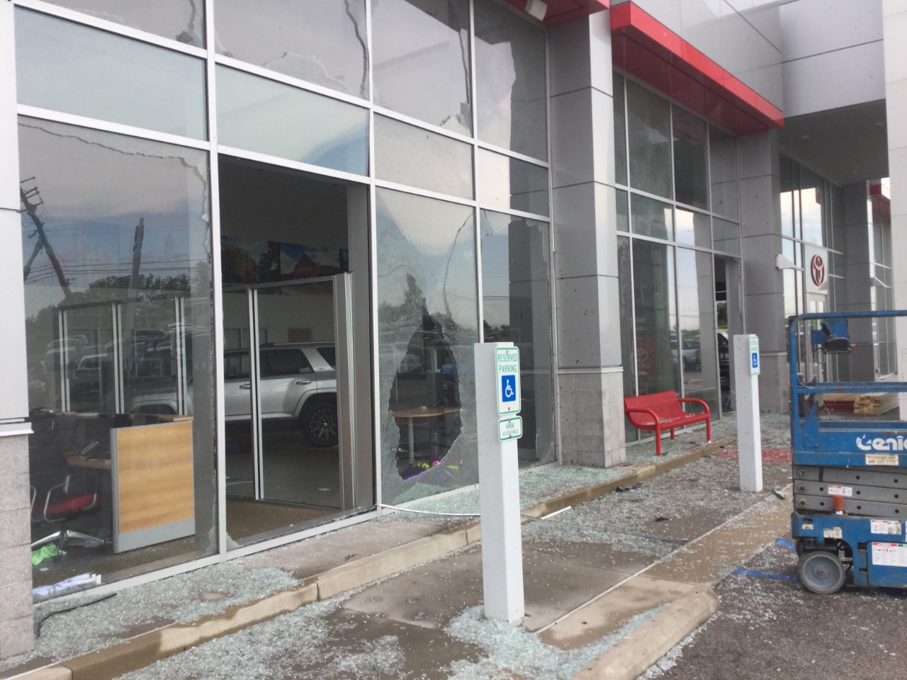 Photo of damage to windows from debris becoming projectiles.