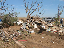 Damage from the first of two tornadoes to impact Ralls, TX. Click on the image for a larger view.