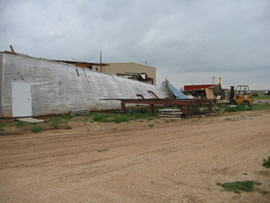 Image of damage from June 9, 2005 storm. Photograph taken by Brian LaMarre, Warning Coordination Meteorologist, WFO Lubbock, TX.