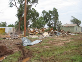 Image of damage from June 9, 2005 storm. Photograph taken by Brian LaMarre, Warning Coordination Meteorologist, WFO Lubbock, TX.