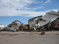 Damage associated with the tornado in the Fair Park area (east of the High School).