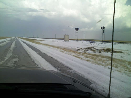 Image of hail taken on Highway 60 between Friona and Bovina around 4:30 pm on 23 April 2008. Picture courtesy of KVII and Coty Ivey. Click on the image for a larger view.