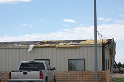 Roof damage produce just north of Abernathy on the evening of 14 August 2008. Photos by Jody James. Click in the image for a larger view.