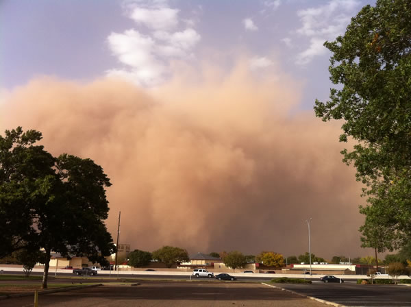 A wall of dust approaches the Science Spectrum from the north around 5:40 pm on 17 October 2011. Photo is courtesy of John Holsenbeck. Click on the image for a larger view.