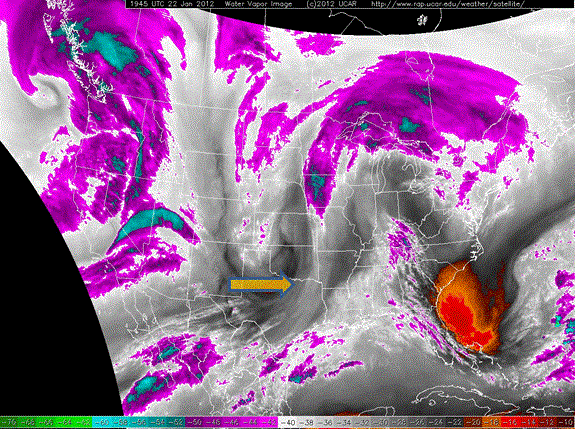 Water vapor satellite image taken at 1:45 pm on Sunday, 22 January 2012. The orange arrow indicates were strong westerly winds were in place on the south side of the passing storm system. Click on the picture for a larger version.