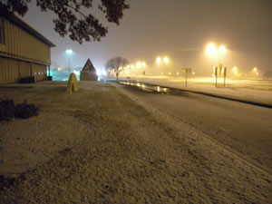 Photo of snow falling at the Science Specturm in south Lubbock