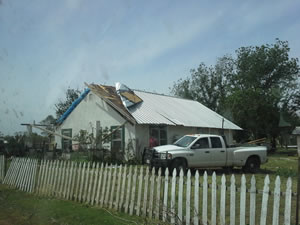 Photograph of roof damage that occurred in Girard. Click on the image for a larger view.