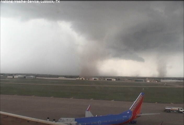Picture of two simultaneous landspout tornadoes just west of the Lubbock International Airport. The image was captured at 4:47 pm on Thursday August 1st.