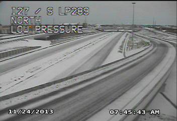 Image captured from a TXDOT webcam during the morning hours of Sunday, November 24th, 2013. The picture shows accumulations of sleet and snow on roadways in Lubbock. The picture is coutesy of TXDOT.