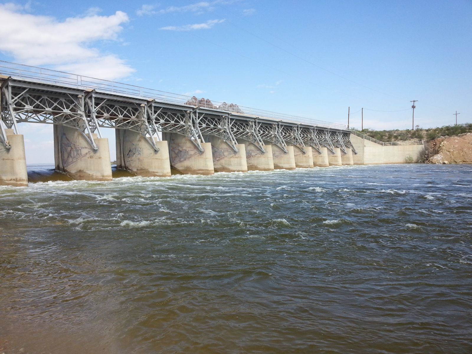 Water spilling out of Red Bluff Reservoir on September 24, 2014. The reservoir is located on the Pecos River southeast of Carlsbad and east of Guadalupe Mountain National Park. 
