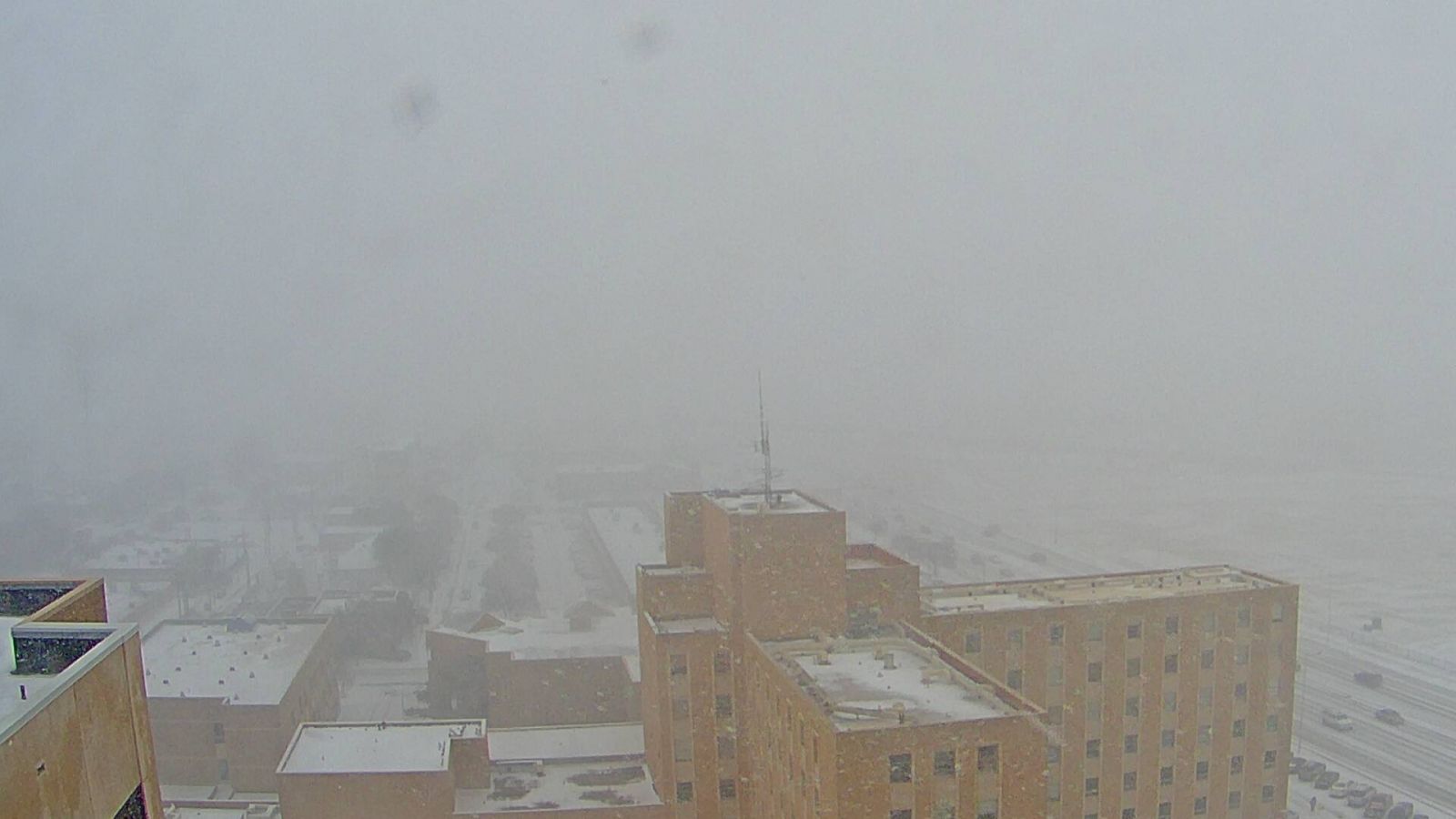 Moderate to heavy snow affecting Lubbock during the early afternoon on Wednesday, March 4th. The image was captured from Covenant Hospital and is courtesy of KAMC.