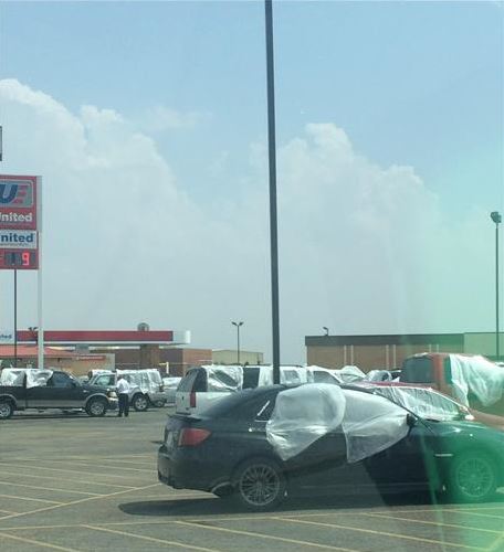 Broken vehicle windows in the United parking lot in Slaton, courtesy of Chris Boger and KCBD.
