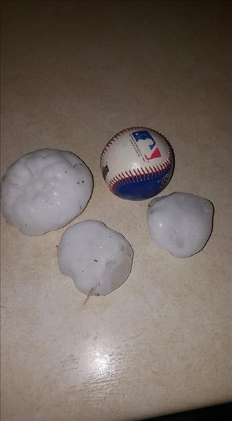 Very large hail that fell near Grassland and Post in Garza County. Photos courtesy KCBD. The right picture was taken by Marbella Montanez.