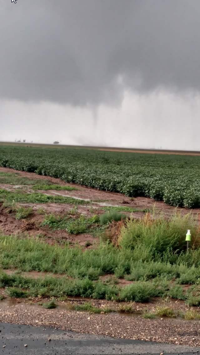 A brief landspout-type tornado captured near Silverton during the afternoon of Monday, 29 August 2016. The pictures are courtesy of Dustin Bach, relayed via KAMR.