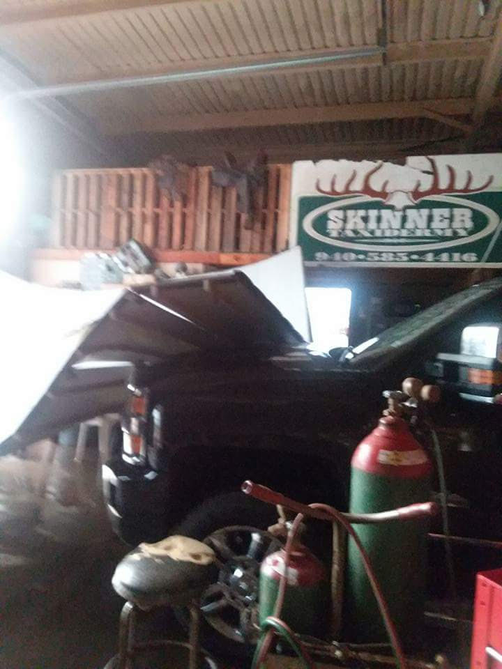 Wind damage to a patio, garage and truck that occurred near Cee Vee on the evening of 17 May. The pictures are courtesy of Dana Skinner.