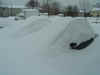 cars buried in snow