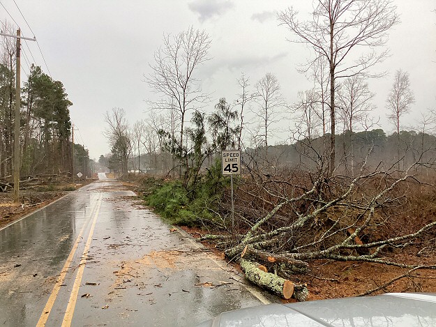 Tree debris was cleared from roads and utility lines and poles were repaired roughly one to two miles east-southeast of Sardis (Saline County) following a weak tornado (rated EF1) on 02/09/2024.