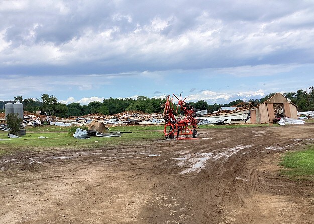 A chicken house was flattened by a tornado (rated EF2) two to three miles south of Scranton (Logan County) early on 06/18/2023.