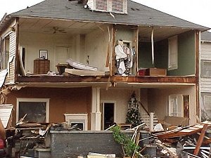 This home on Main Street in Beebe (White County) resembled a doll house (rooms visible from the outside) after it was hit by a tornado on 01/21/1999.
