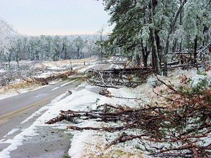This road was blocked by tree debris about 2 miles south-southwest of Evening Shade (Sharp County) on 01/30/2009.