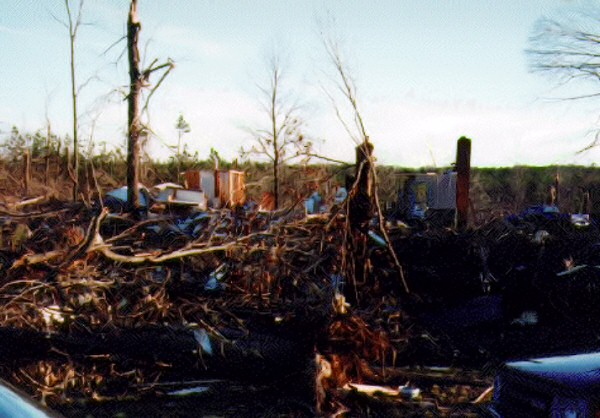 A home was dismantled by a tornado (rated F4) near Vimy Ridge (Saline County) on 03/01/1997. A short while later, the same tornado flattened a home at College Station (Pulaski County). Behind the latter home was a church that was hit during choir practice (20 to 30 participants). Nobody in the church was injured. The photos are courtesy of Chris Smith, National Weather Service Southern Region Headquarters.