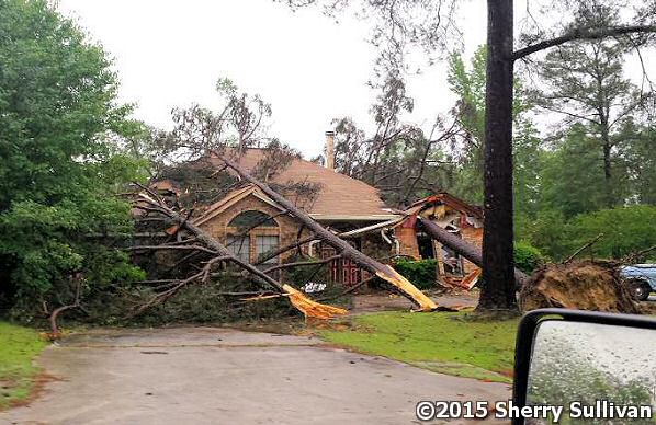 A tornado (rated EF2) uprooted and snapped trees onto this home at Nashville (Howard County) late on 05/10/2015.