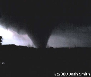 A tornado approached Clinton (Van Buren County) from the southwest toward sunset on 02/05/2008. The tornado tracked a state record 122 miles through seven counties, and was responsible for thirteen fatalities. The photo is courtesy of Josh Smith.
