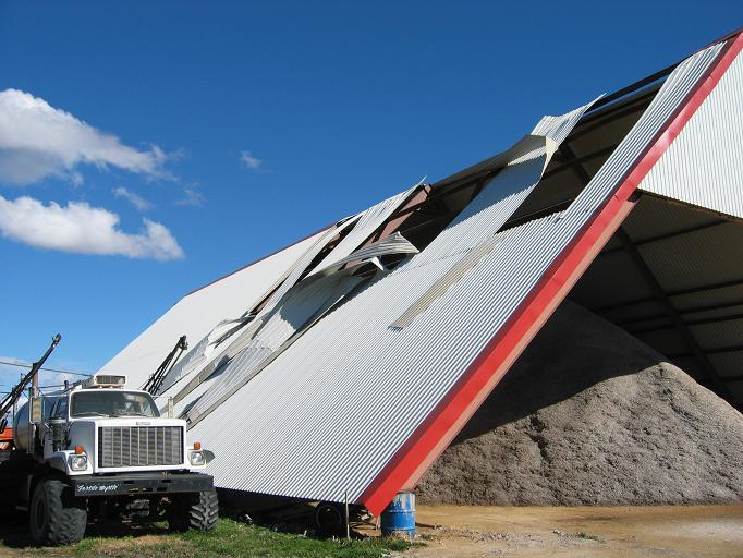 photo of a partially removed metal roof