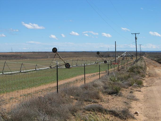 photo of a irrigation system blown on it's side