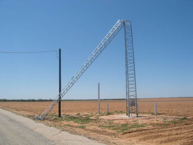 Storm damage showing large tank blown down