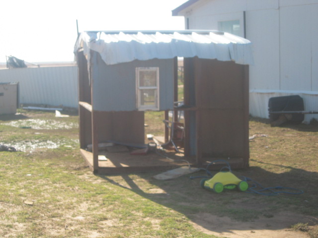 Storm damage showing a damaged storage shed