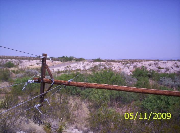 Damaged distribution poles north of Farm to Market Road 2627 in Brewster County.