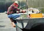 Person working on boat