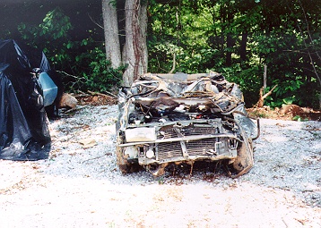 View of car damaged by flood waters