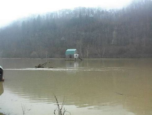 View of the Clinch river in flood along Highway 33 in Hancock County.