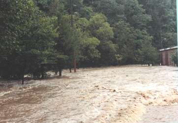 View looking downstream in front of the school.