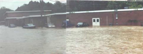 View after the crest. Water was up to the windows of these cars and about three feet deep in the school.