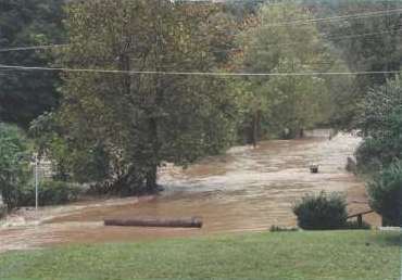 View showing the flooding creek between 100 and 150 feet wide.
