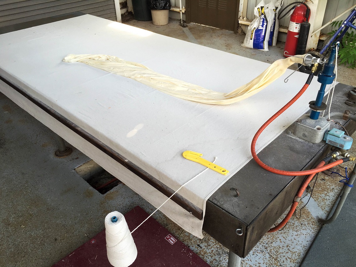 Balloon connected to nozzle prior to filling