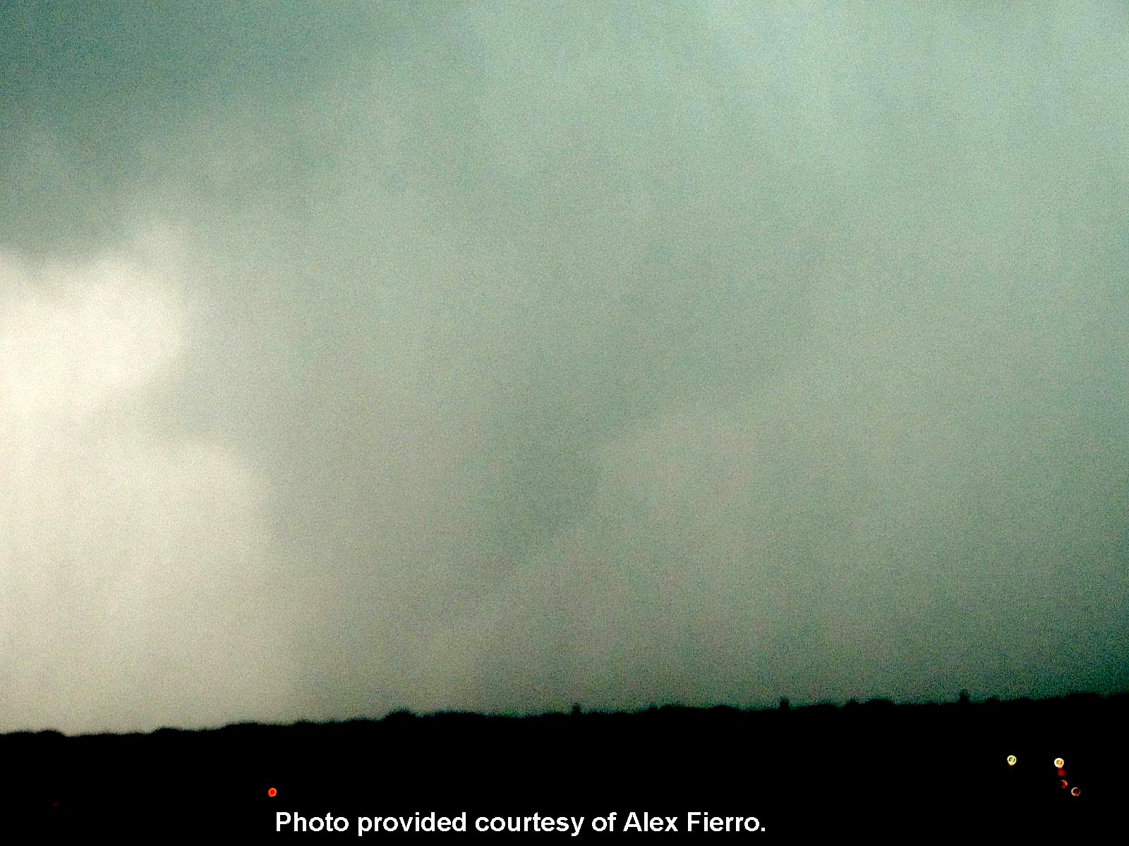 Photo of the April 13, 2012 Norman, Oklahoma Tornado taken from the observatory deck of the National Weather Center by Alex Fierro.