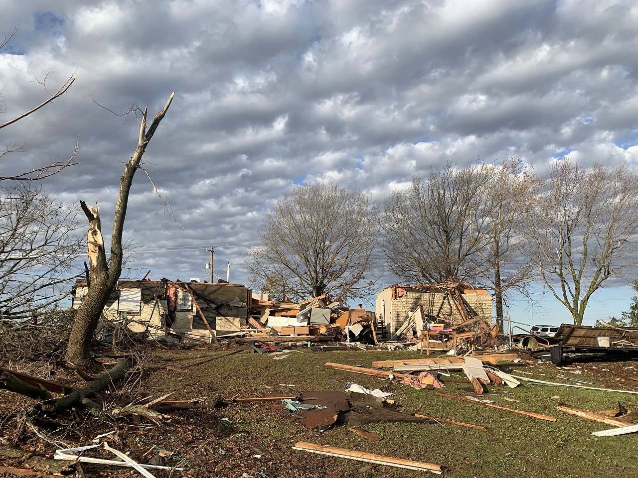 December 13, 2022 - Photo of a damaged home and a workshop about 1 mile north-northeast of Wayne, OK along Nicholas Drive