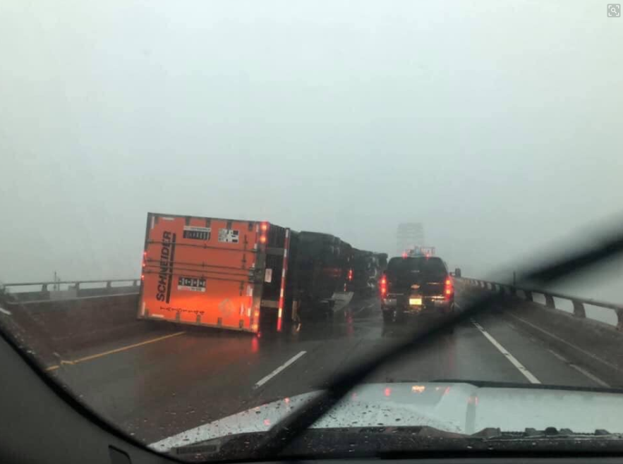 Photo of overturned truck on I-24 at Ohio River bridge